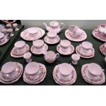 A Colclough tea service with pink and green floral decoration on a white ground comprising: six