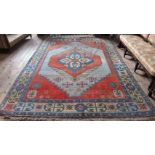 A large Turkish Kars patterned carpet, 144 x 105cm.
