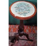 An Edwardian tilt-top table with oval tapestry panel, formerly a pole screen.