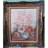 A gilt framed oil on canvas, still life floral study, indistinctly signed.