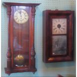 A Victorian mahogany Vienna wall clock, together with another Victorian wall clock,