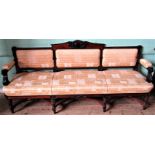 A 19th century mahogany framed three to four seater settee, with gold upholstery and Latin verse,