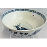 A 19th century Worcester blue and white bowl decorated in the Oriental manner depicting tree,