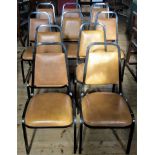 A set of ten mid-20th century metal framed and leatherette upholstered stacking chairs.