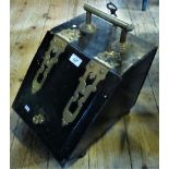 A 19th century metal and brass bound coal scuttle.