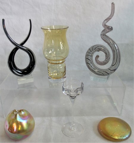 A collection of six items of studio glass, to include: a Caithness candlestick,