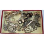 A quantity of mainly silver jewellery to include: bracelets, necklaces and chains (mostly damaged).