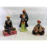 Three Royal Doulton figurines; Omar Khayam HN2247, Bluebeard HN2015 and Medicant HN1365.