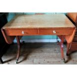 A 20th century satin wood sofa table.