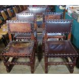 A set of five 20th century oak framed and leather studded dining chairs (one carver, four standard).