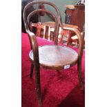 A child's bentwood armchair.