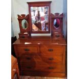 A 19th century walnut dressing chest, three mirror super-structure,