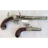 Two reproduction pistols.