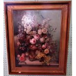 A gilt framed oil on board still life, study of fruit and flowers, signed M H Wenn.