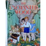 A copy of The Enchanted Wood by Enid Blyton published by Newnes in May 1939 as a first edition.