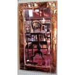 An early 20th century rectangular glass framed wall mirror.