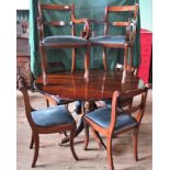 A reproduction mahogany dining room suite, comprising: tilt-top table, six dining chairs (2 carvers,