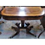 A Victorian mahogany rosewood and inlaid fold-over card table, on central column, quatrefoil base,