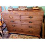A 19th century mahogany chest of two short over three long drawers on ogee bracket feet.