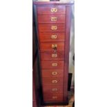 An eleven drawer pitch pine Wellington chest.