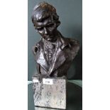 A 19th century bronze bust of a young gentleman on square marble base.