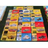 A collection of twenty Corgi Vanguards, to include: Morris Minor police car, Triumph TR3A,