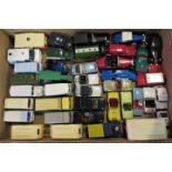 A collection of forty Dinky and Corgi play worn toys, to include: Standard Atlas caravanettes,