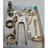 A quantity of silver items, to include: sugar shaker, sugar tongs, ladle and other items.