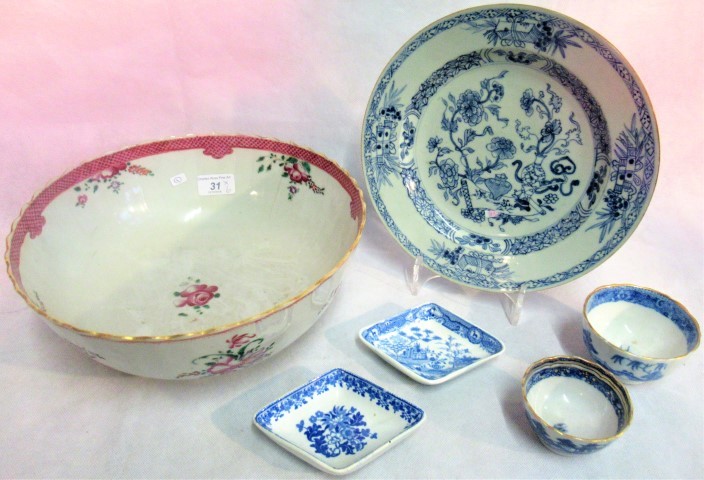 An 18th century blue and white Nanking plate, together with two Spode pickle dishes,