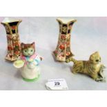 A small Royal Doulton cat, together with a Beswick Bunnykins figure Mrs Ribby,