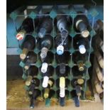 Twenty-four bottles of mixed white wine, together with wine rack.