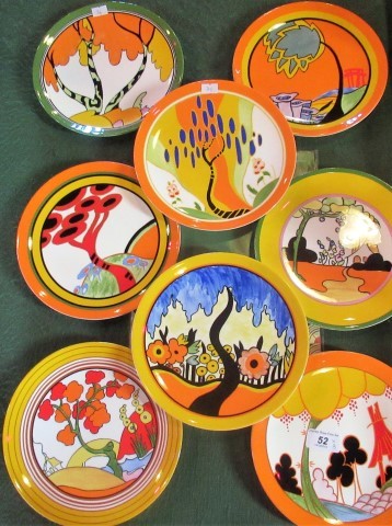 A collection of eight limited edition Wedgwood plates in the Bizarre pattern from The World of