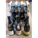 Twelve bottles of Kriter champagne, to include wine rack.