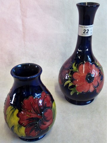 A Moorcroft slender necked vase, together with a small Moorcroft bulbous vase,