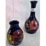 A Moorcroft slender necked vase, together with a small Moorcroft bulbous vase,