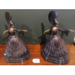 Two contemporary bronzed figurines of Continental female dancers.