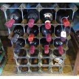 Twelve bottles of mixed red wine, to include wine rack.