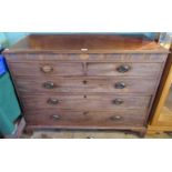 A Georgian mahogany chest of two short over three long drawers on ogee bracket feet.