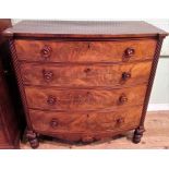 A Victorian mahogany chest of four long graduated drawers.