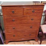 An Edwardian mahogany and inlaid chest of two short over three long drawers.