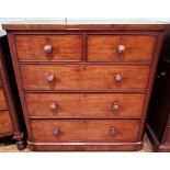 A Victorian mahogany chest of two short over three long drawers.