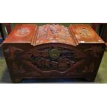 A 20th century profusely carved camphor wood chest.