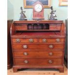 A 19th century mahogany campaign cylinder bureau,