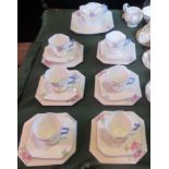 A Windsor china hand painted tea service, comprising: six trios, cake plate,