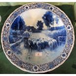 A 19th century blue and white Delft charger,