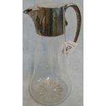 A silver topped plain glass claret jug by John Heath & John Middleton, London hallmarks.