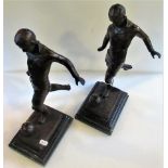 Two bronzed football trophies depicting Stanley Matthews.