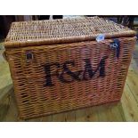 A Fortnum & Mason picnic basket.