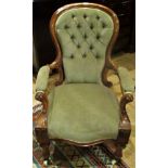 A Victorian mahogany framed spoon back library chair, with olive green draylon upholstery.