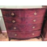 A Victorian mahogany bow front chest of two short drawers over three long drawers,